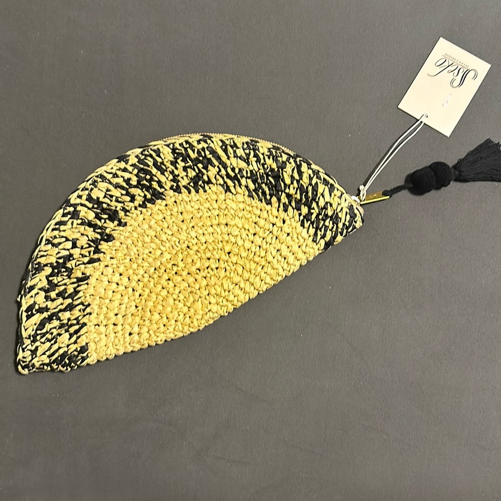 Woven Crescent Pom Clutch.